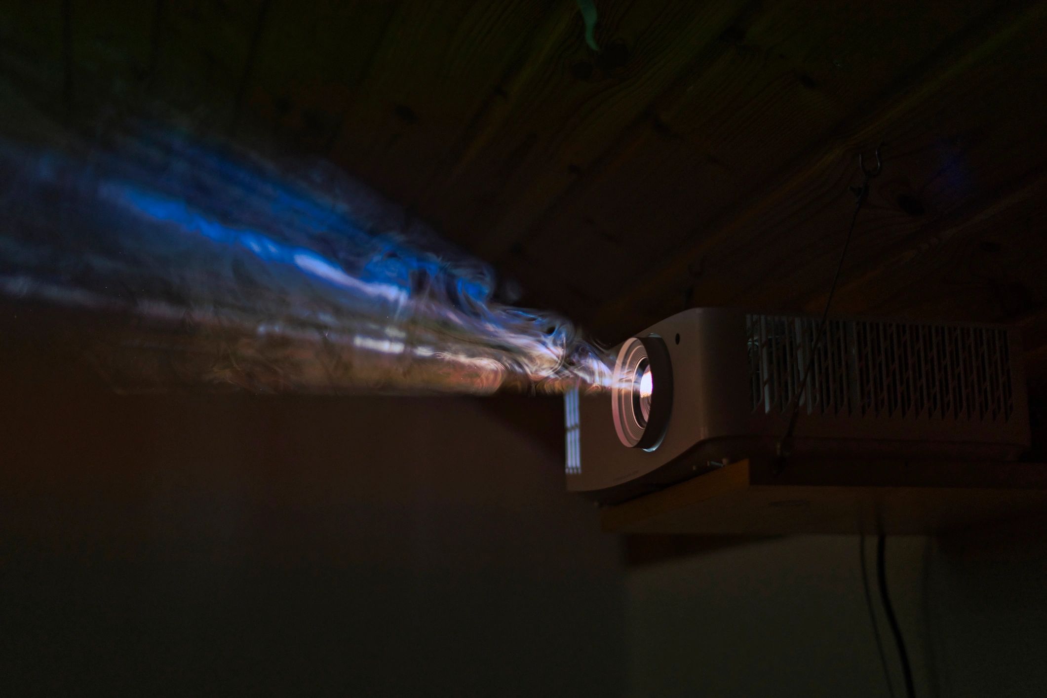 Projector beam representing AV presentation systems